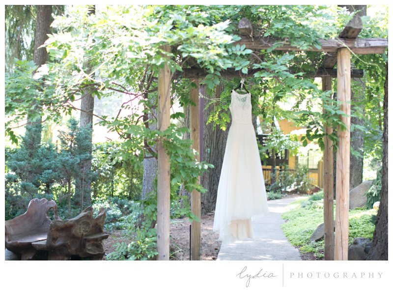 Bridal dress in the Tahoe forest at Harmony Ridge Lodge wedding in Nevada City, California.