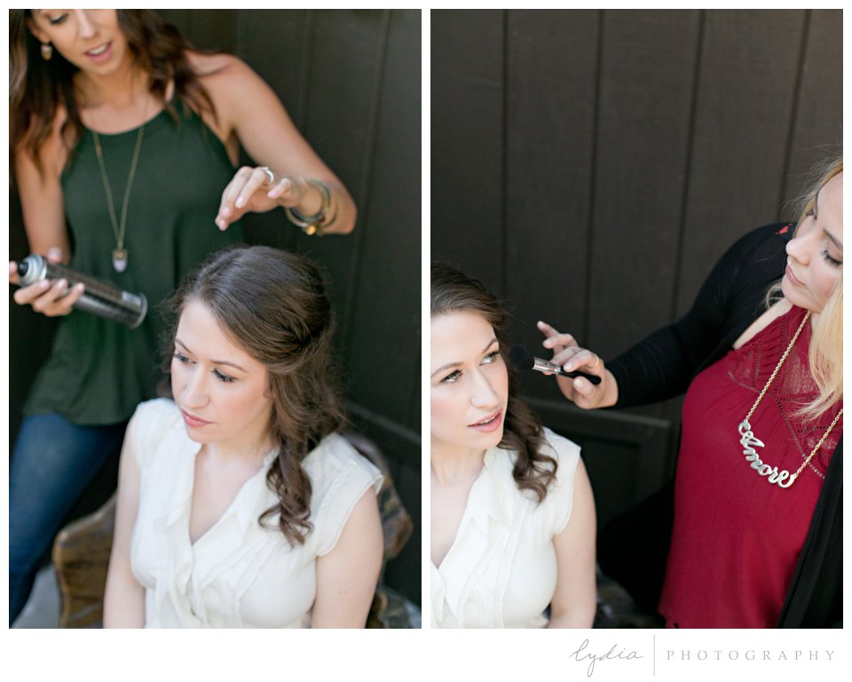 Bride having her hair and makeup done at Harmony Ridge Lodge Jewish wedding in the Tahoe National Forest in California.