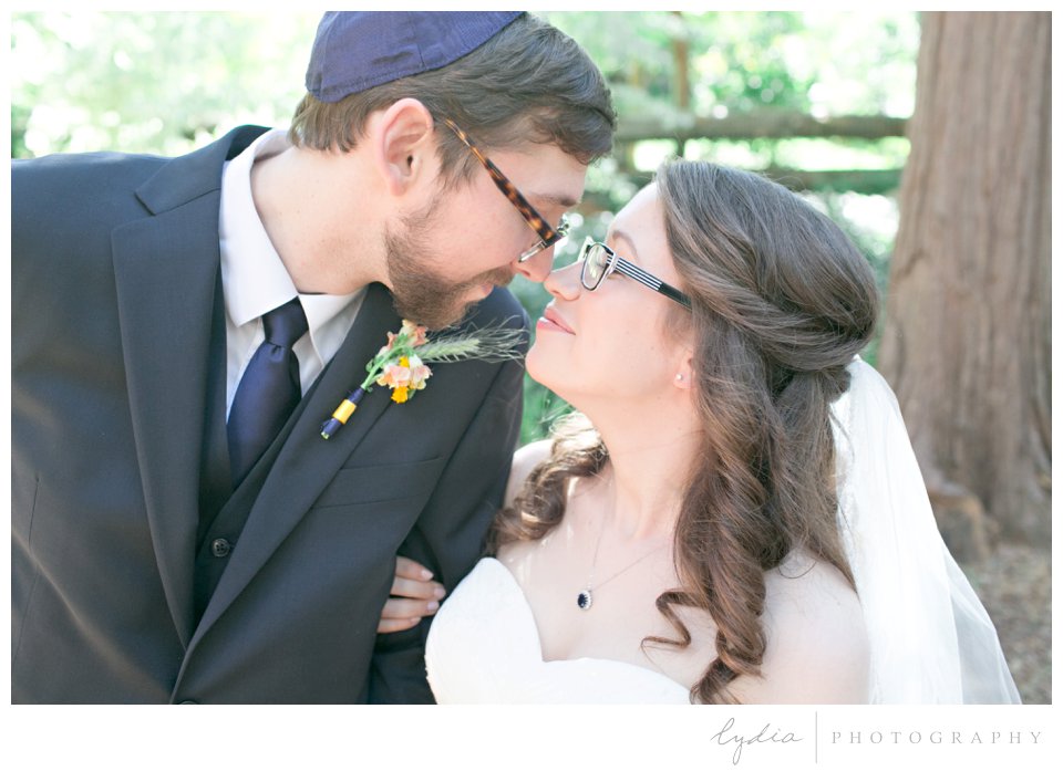 Bride and groom at Harmony Ridge Lodge Jewish wedding in the Tahoe National Forest in California.