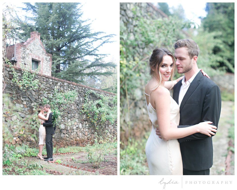 Bride and groom in secret garden at intimate elopement for European wedding styled inspiration.
