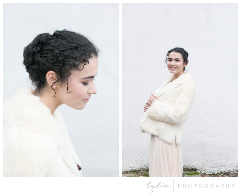 Bridal curly hair updo in a french twist for California and destination weddings.