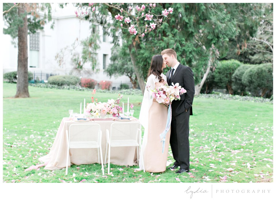 Bride and groom kissing at California State Capitol wedding.