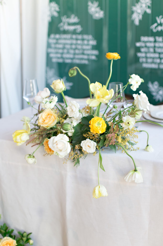 Yellow wedding floral table centerpiece