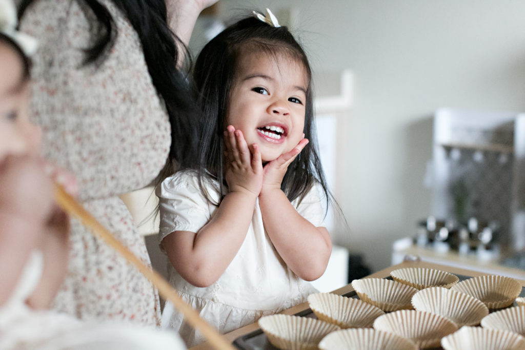 Little girl baking for Sacramento lifestyle family portraits